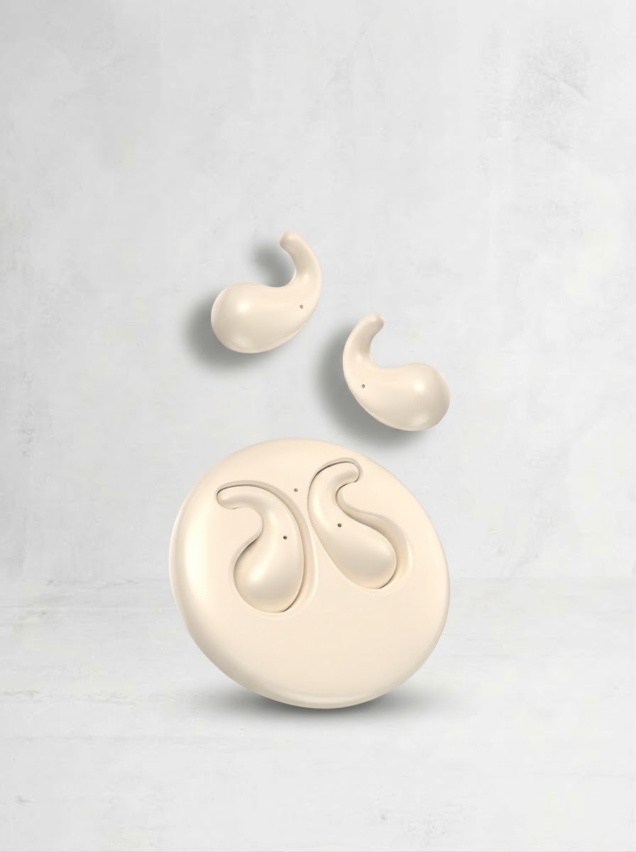 The Frequency in cream, with its round charging case